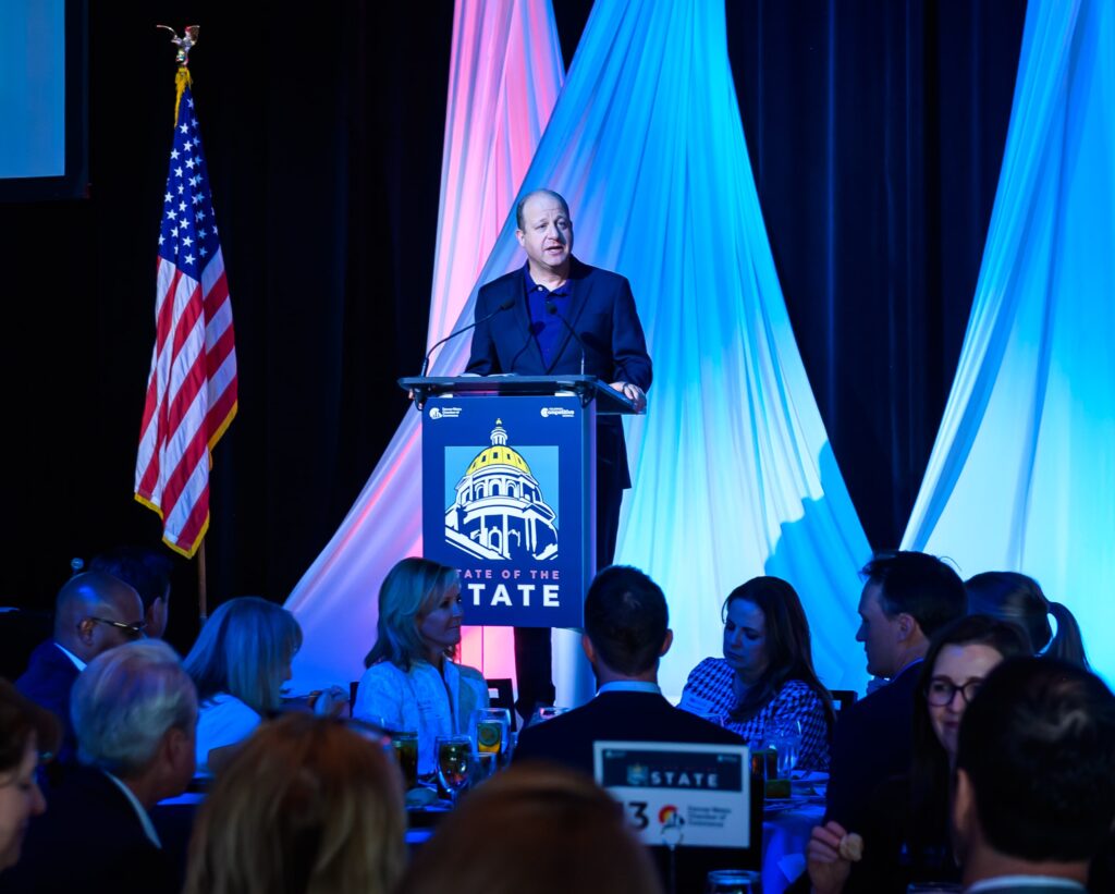Governor Jared Polis addresses audience at State of the State