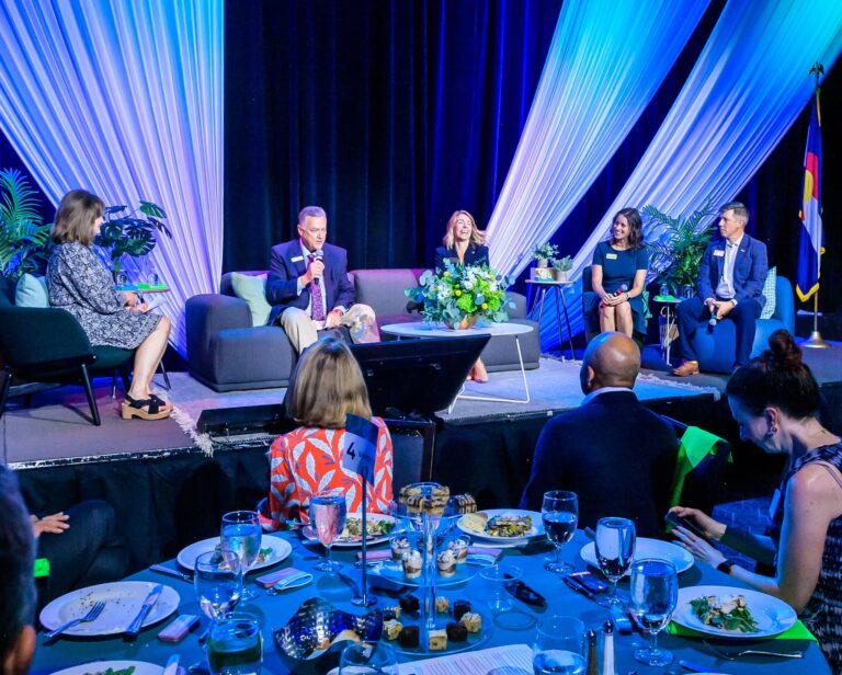 A panel of mayors discuss business issues at the Denver Metro Chamber's State of the Cities event